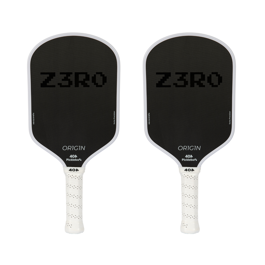 Two black pickleball paddles with white handles, featuring the brand 'Z3RO'.